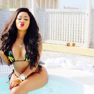 Life is a beach! Kenyan socialite Vera Sidika shows off her curvacious body in tiny bikini